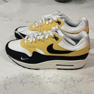 Nike Air Max..Black, Yellow/Gold, and white